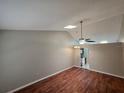 Spacious living room with hardwood floors and a ceiling fan at 320 Eron Way # 6, Winter Garden, FL 34787