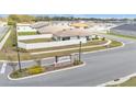 Aerial view of a neighborhood featuring well-maintained homes and fenced yards in a Gathering-friendly community at 4424 Reding Way, Lakeland, FL 33813