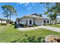 Well-maintained single-story home with mature landscaping and inviting curb appeal at 6217 Peacock Run, Lakeland, FL 33809