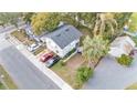 Aerial view of a charming home with a well-maintained yard and convenient off-street parking at 723 W Patterson St, Lakeland, FL 33803