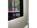 Close-up of electric fireplace controls with color-changing crystals at 692 Augusta Rd, Winter Haven, FL 33884