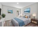 Comfortable bedroom with neutral decor and plenty of natural light at 304 Ave P Nw, Winter Haven, FL 33881
