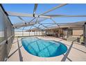 Inviting screened-in pool area with ample space for outdoor lounging and entertaining at 3137 Winchester Estates Loop, Lakeland, FL 33810
