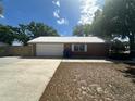 This lovely home has a detached garage and driveway to accommodate parking needs at 330 W Wellington Dr, Lakeland, FL 33813