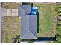 An aerial view of the home's roof and backyard, showing a well-maintained property at 4228 Sunny Land Dr, Lakeland, FL 33813