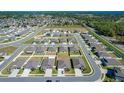 Extensive aerial view showcases the community layout, green spaces, and residential streets at 2929 Flying Blackbird Rd, Bartow, FL 33830