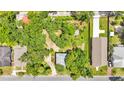 Aerial view of the property, outlining the house, yard and the surrounding greenery at 205 W Belmar St, Lakeland, FL 33803