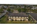 Beautifully maintained townhouse with well-lit windows and a spacious backyard area at 517 Sandstone St, Lakeland, FL 33809