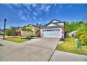 A well-maintained home with a spacious driveway and curb appeal at 6286 Manitoba Dr, Lakeland, FL 33805
