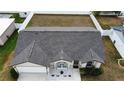 Aerial view of a single story home with a fenced backyard and well-maintained roof at 7968 Charleston Blvd, Lakeland, FL 33810
