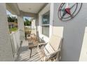 Inviting front porch area with comfortable seating, perfect for relaxing and enjoying the neighborhood views at 3425 Sutton Ridge St, Lakeland, FL 33810