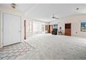 Spacious living room with high ceilings, neutral paint, and abundant natural light throughout at 537 Eagle Run, Lakeland, FL 33809