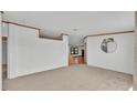 Neutral living room with carpeted floors and potential for customization at 8341 Mitchall Dr, Lakeland, FL 33809