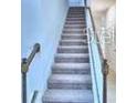 Carpeted staircase at 2307 Brassie Ct, Winter Haven, FL 33884