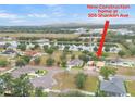 An aerial view of a new construction home with a water view in a beautiful community at 505 Shanklin Ave, Bartow, FL 33830