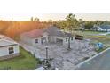 Newly constructed single Gathering home featuring an attached two-car garage and tidy landscaping at 505 Shanklin Ave, Bartow, FL 33830