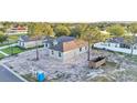 A single Gathering home featuring a new exterior, landscaping that is in progress, and an attached garage at 505 Shanklin Ave, Bartow, FL 33830
