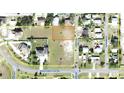 Aerial view of a vacant lot in a residential neighborhood near Eagle Lake at 0 Eagle Lake Loop Rd, Eagle Lake, FL 33839