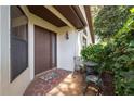 Inviting front porch with stylish seating area, creating a warm and welcoming entrance to the residence at 139 Stratford Ct, Haines City, FL 33844