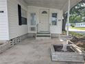 Inviting front entrance with a decorative door and well-kept walkway at 1610 Reynolds Rd # 80, Lakeland, FL 33801