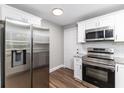 Modern kitchen featuring stainless steel appliances, subway tile backsplash, and granite countertops at 2400 Avenue D Sw, Winter Haven, FL 33880