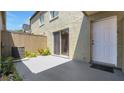 Private backyard features a concrete patio, sliding glass door and rear entrance door at 2500 21St Nw St # 78, Winter Haven, FL 33881