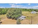 Aerial view of a single Gathering home on a large lot with mature trees and a fenced yard at 3728 Old Polk City Rd, Lakeland, FL 33809
