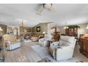 Spacious living room featuring tile flooring, elegant furniture and an abundance of natural light at 538 Eagle Run, Lakeland, FL 33809