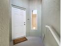This home's entryway has a secure door and welcoming aesthetic at 3852 Serenade Ln, Lakeland, FL 33811