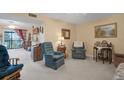 Relaxing living room with furniture and a view of the balcony at 1130 N Lake Parker Ave # C321, Lakeland, FL 33805