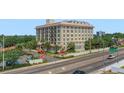 Wide exterior view showing The Haven's building with balcony views and surrounding greenery from the street at 235 6Th Nw St # 307, Winter Haven, FL 33881