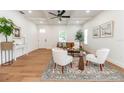 Bright living room with hardwood floors, stylish furnishings, and coffered ceilings at 527 W Park St, Lakeland, FL 33803