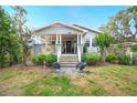 Inviting home exterior with landscaped front yard and a welcoming entryway at 807 Osceola St, Lakeland, FL 33801