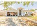 Charming single-story home with a well-maintained lawn and a two-car garage, perfect for a Gathering at 1061 Lowry Ave, Lakeland, FL 33801