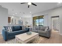 Spacious living room with hardwood floors and comfortable seating at 1470 Silver Leaf Dr, Lakeland, FL 33813