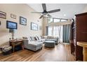 Spacious living room with vaulted ceilings, modern furnishings, and natural light at 1808 Stonecrest Ct, Lakeland, FL 33813
