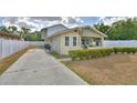 Well-maintained property with a long driveway and classic front porch at 640 Waldon N Ave, Bartow, FL 33830