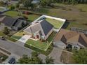 Aerial view of the home showcasing the fenced backyard and landscaping at 4041 Byrds Crossing Dr, Lakeland, FL 33812