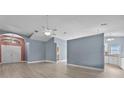 Bright and airy living room featuring modern floors and neutral walls at 6086 Swallow Dr, Lakeland, FL 33809