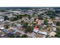 An aerial view reveals the property's location and surrounding neighborhood at 415 Manor Dr, Bartow, FL 33830