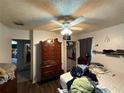 Bright bedroom featuring a ceiling fan and large closet for ample storage at 1208 Lowry Ave, Haines City, FL 33844