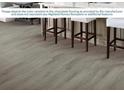 Close-up of the vinyl plank flooring, highlighting the color variation as provided by the manufacturer at 5393 Se 129Th Ln, Belleview, FL 34420