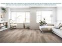 Spacious living room showcasing the vinyl plank flooring provided by the manufacturer at 1819 Daystar Dr, Haines City, FL 33844
