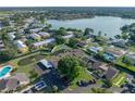 Scenic aerial view of the community with lake, pond, and mature trees at 2025 Sylvester Rd # P4, Lakeland, FL 33803