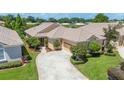 Expansive aerial view of a home with lush green landscaping and a well maintained exterior at 2425 Laurel Glen Dr, Lakeland, FL 33803