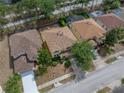 An aerial view showcases this property with its well-maintained yard and nearby neighborhood amenities at 143 Alfani St, Davenport, FL 33896