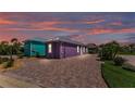Beautiful home with a paver driveway and lush landscaping at 3052 Wood Duck Dr, Polk City, FL 33868