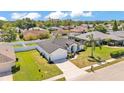 Well-maintained home with a two-car garage, fresh landscaping, and lovely curb appeal at 5458 Oakford Dr, Lakeland, FL 33812