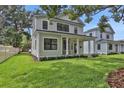 Attractive two-story home with a well-manicured lawn and tasteful landscaping at 731 S Missouri Ave, Lakeland, FL 33815