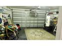 Spacious garage with ample storage space, workbench, and room for two cars at 550 Patton Loop, Bartow, FL 33830